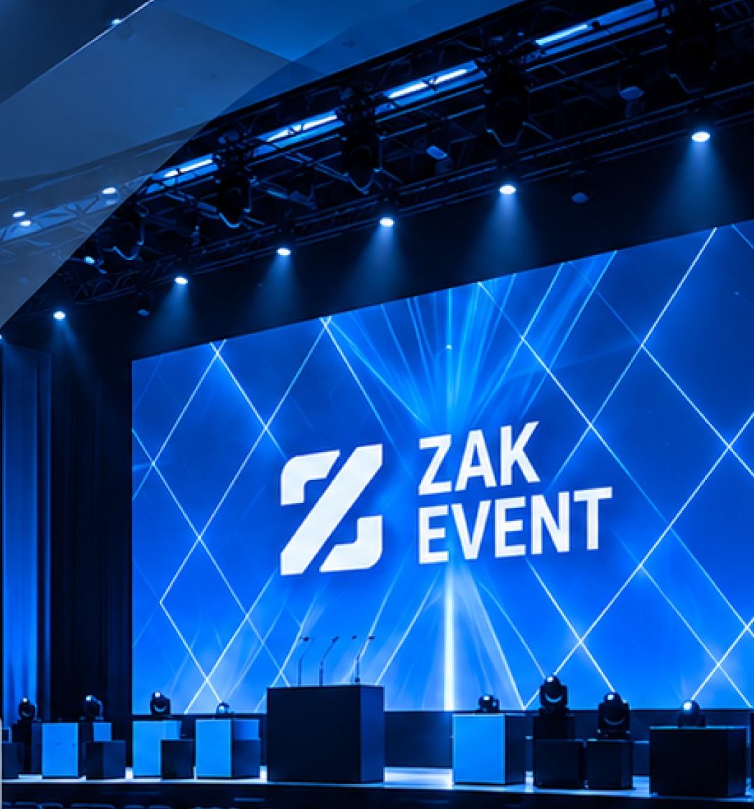 Conference stage with the ZAK Event logo on a blue LED wall